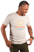 A man wearing a light beige crewneck t-shirt with a graphic print of a yellow sun, orange text reading 'Vida del lago', and blue waves. He is also wearing dark olive green pants, set against a plain white background.
