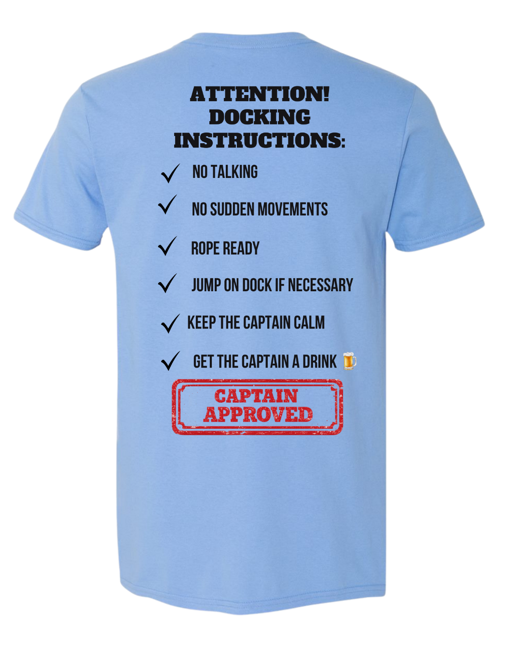 A light blue short-sleeve t-shirt shown from the back, featuring a humorous checklist titled 'ATTENTION! DOCKING INSTRUCTIONS:' in black text, with a red 'CAPTAIN APPROVED' stamp graphic at the bottom.