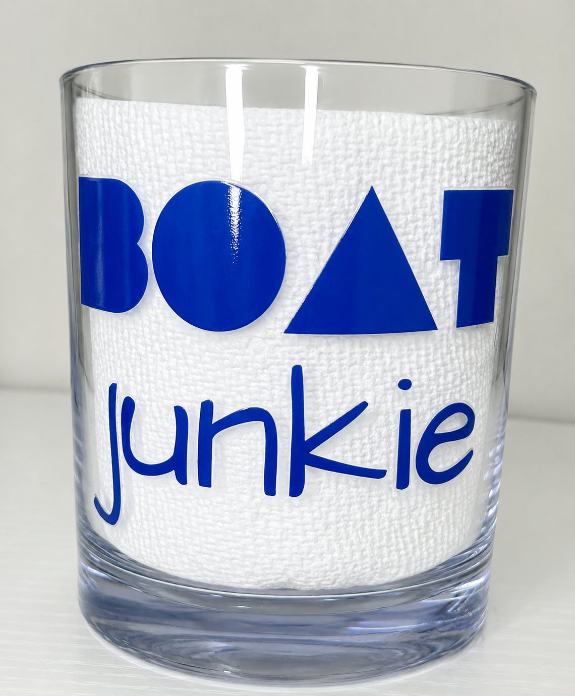 Lowball glass with the wording Boat Junkie