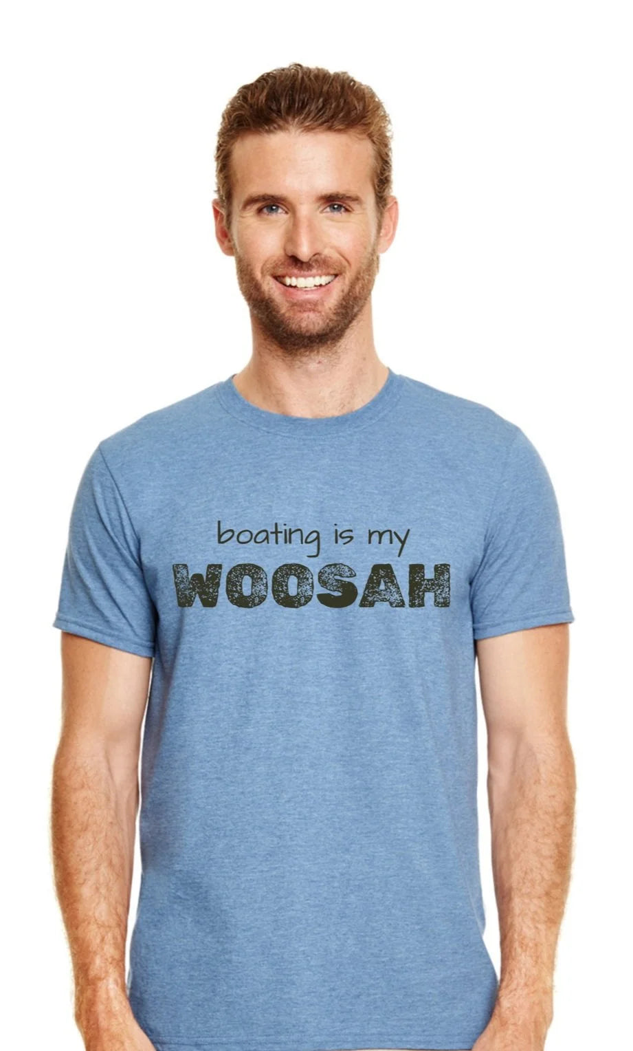 A smiling man with short brown hair and a beard wearing a heather blue t-shirt with the text 'boating is my WOOSAH' printed on the chest, set against a plain white background.
