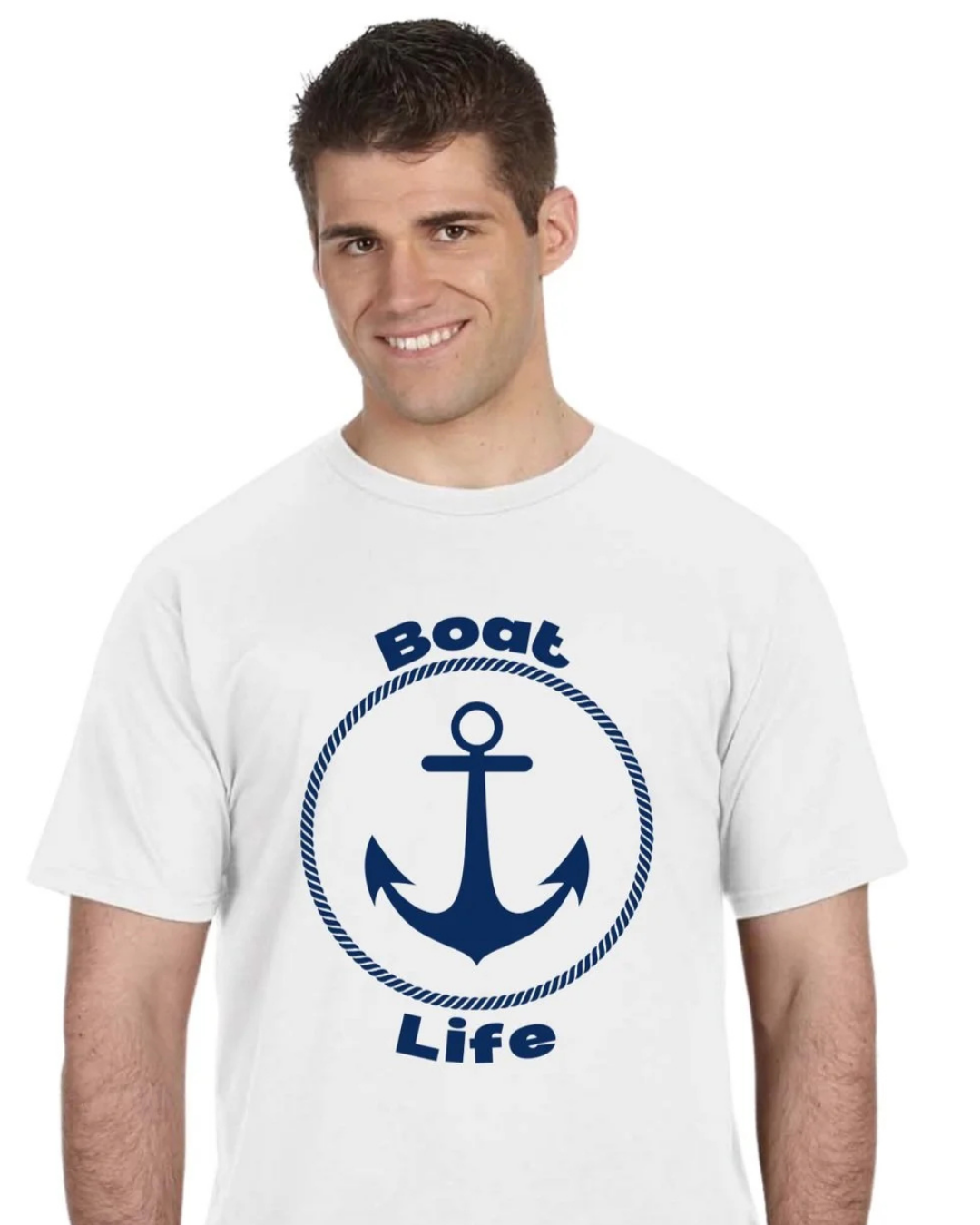 A man wearing a white short-sleeve t-shirt with a navy blue graphic on the chest featuring an anchor inside a rope circle with the words 'Boat Life'.