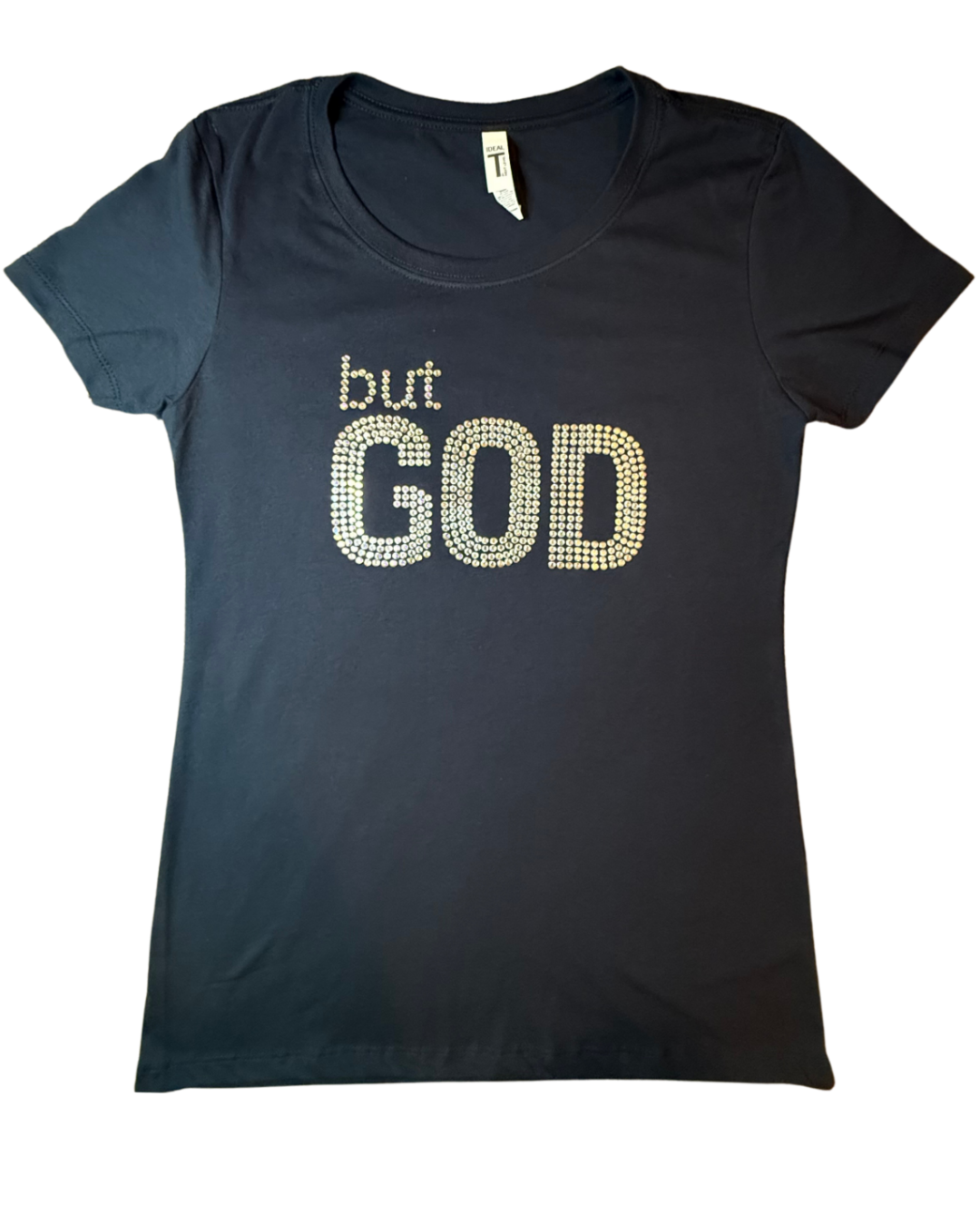 A women's short-sleeve crewneck t-shirt in black, featuring the text 'but GOD' embellished with clear rhinestones on the front, displayed against a plain white background.