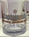 A clear glass tumbler with a thick base, featuring a dark brown ship's wheel graphic and the text 'Captain-ish' and 'Captain energy.