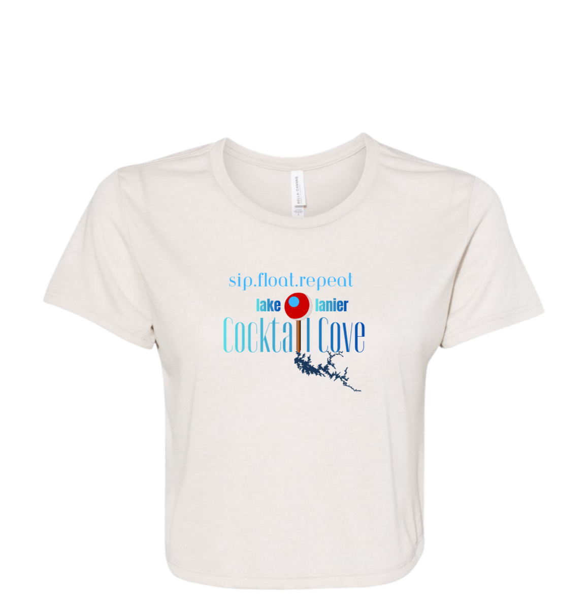 An off-white short-sleeve crewneck t-shirt with a graphic print on the front. The graphic features the text 'sip,float,repeat', 'lake lanier', and 'Cocktail Cove' in blue and red, along with an illustration of Lake Lanier and a pin showing the location of the cove