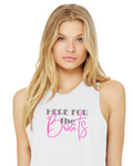 A blonde woman wearing a white sleeveless tank top with the text 'HERE FOR The Boats' printed on the front in gray and bright pink, set against a plain white background.