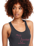 A woman with curly brown hair wearing a black racerback tank top with pink text that reads 'I'm a hooker' and '#fishingvibes' on a white background.