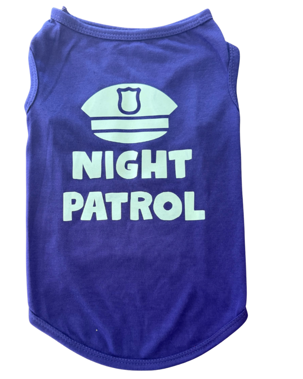 A purple sleeveless pet shirt with a glow in the dark graphic of a police badge and the words 'NIGHT PATROL' printed on the front, shown against a plain white background.