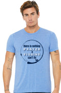 A man wearing a heather blue crewneck t-shirt with a dark navy graphic print that reads 'there is nothing PRAYER & FISHING can't fix' inside a circular design, set against a plain white background.