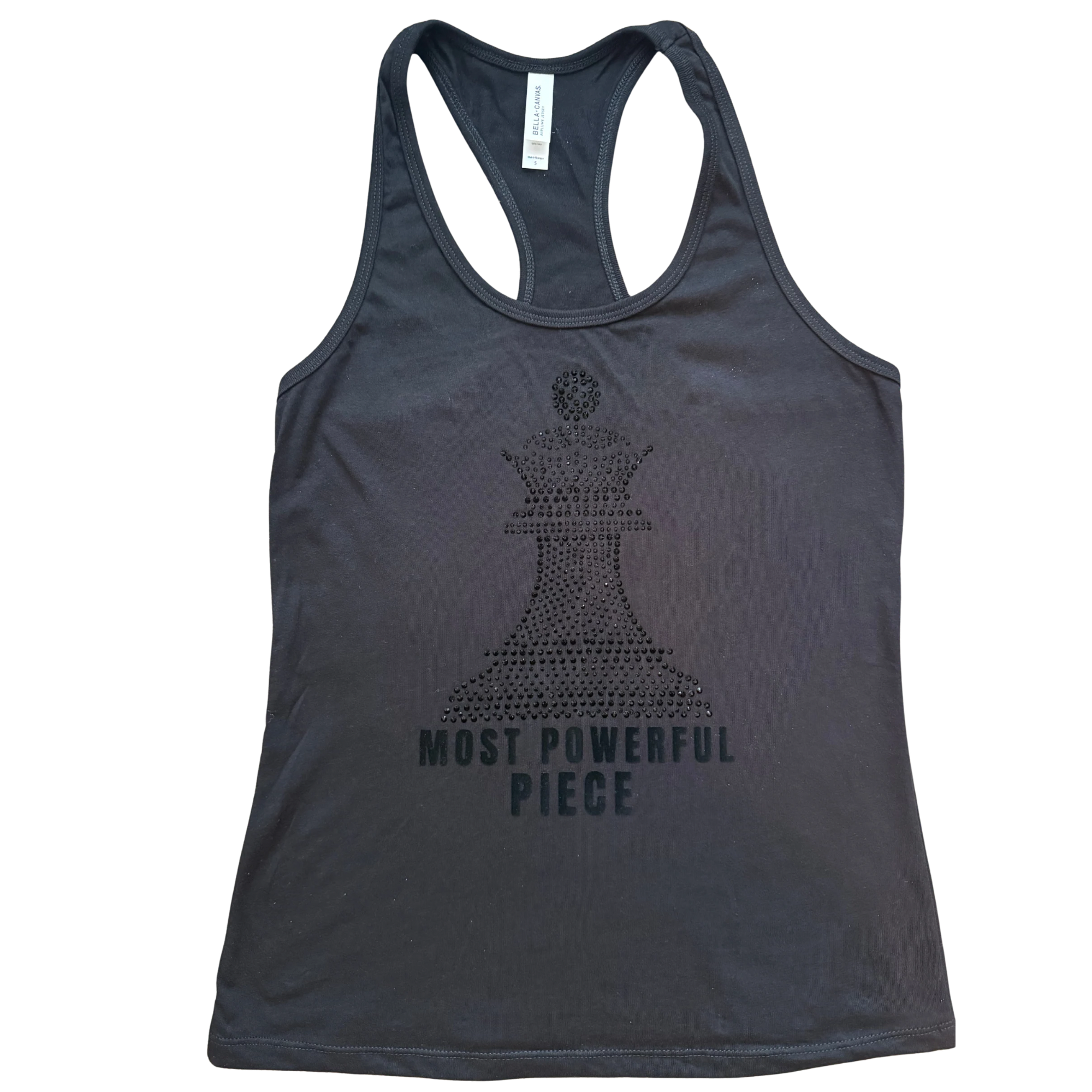 Black racerback  tank top with  black chess queen graphic made of rhinestone. with the text 'MOST POWERFUL PIECE' below in bold black letters.