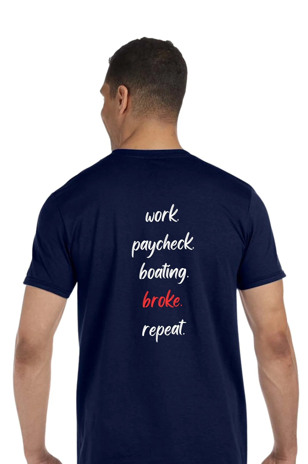A man viewed from the back wearing a navy blue t-shirt with the text 'work paycheck boating. broke repeat' printed on the back in white and red.